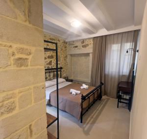Кровать или кровати в номере Casa dei Maestri