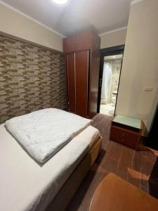 A bed or beds in a room at بورتو مارينا الساحل الشمالى