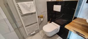Koupelna v ubytování XuBa ApartmentRooms Messe Wien Prater