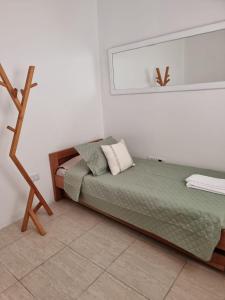 Una cama o camas en una habitación de HOSTERIA CAROL