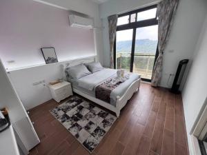 林莊園包棟別墅Skydoorzi Villa房間的床
