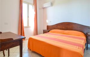 Giường trong phòng chung tại Pet Friendly Home In Orosei