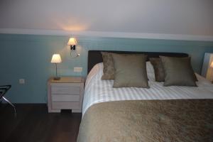 Postel nebo postele na pokoji v ubytování B&B Riche Terre