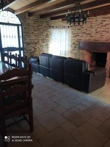 A seating area at CHALET VACACIONAL a 10 minutos de la playa de La Barrosa