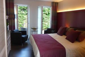 Postel nebo postele na pokoji v ubytování B&B Riche Terre