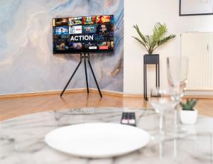 TV a/nebo společenská místnost v ubytování Penthouse-Suite near University
