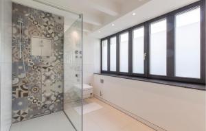Ein Badezimmer in der Unterkunft Prora Solitaire Avida Loft 3