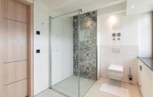 Ein Badezimmer in der Unterkunft Prora Solitaire Avida Loft 3