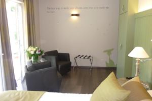 Posezení v ubytování B&B Riche Terre