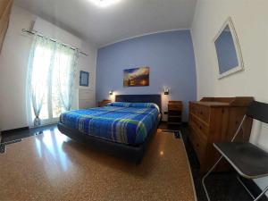 A bed or beds in a room at Apartment Gentile a 200 metri dal mare