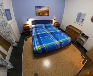 A bed or beds in a room at Apartment Gentile a 200 metri dal mare