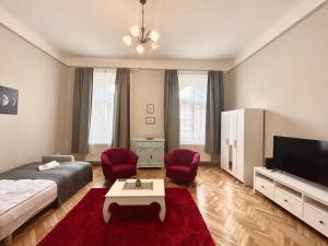 Μια τηλεόραση ή/και κέντρο ψυχαγωγίας στο Fullmoon Apartments 2