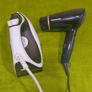 a hairdryer and a hair dryer at IJM Homestay Condominium in Sandakan