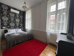 Ένα ή περισσότερα κρεβάτια σε δωμάτιο στο Fullmoon Apartments 2