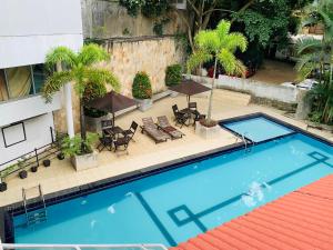 an overhead view of a swimming pool in a hotel at Hotel Gangaaddara in Kandy