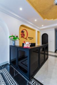 a black table in a room with a box on it at Q Boutique Hotel in Nha Trang