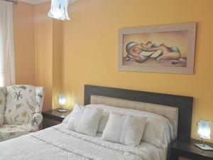 Cama ou camas em um quarto em alojamiento de lujo en playa arenal de Burriana