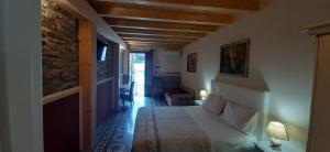 a bedroom with a bed in a room at Al Castello in Milazzo