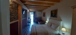 Postel nebo postele na pokoji v ubytování Al Castello B&B