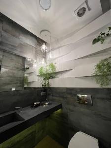 Ванна кімната в Blum Hotel