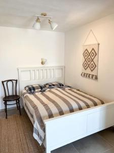 Postel nebo postele na pokoji v ubytování Csendár Cottage Balaton + 22 fotografií