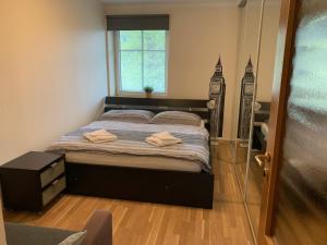 Postel nebo postele na pokoji v ubytování Apartments Monika