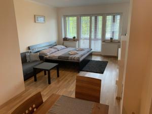 Postel nebo postele na pokoji v ubytování Apartments Monika