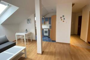 Kuchyň nebo kuchyňský kout v ubytování Apartament NOWY