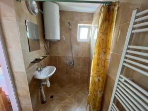 Koupelna v ubytování Guest House Paskal + 37 fotografií
