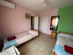 Postel nebo postele na pokoji v ubytování Guest House Paskal