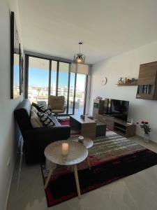 Posezení v ubytování Unforgettable Experience in a Modern Apartment!