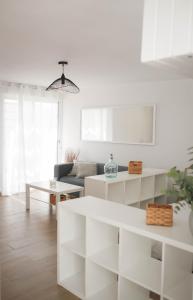 TV a/nebo společenská místnost v ubytování Bungalow con encanto y vistas al mar