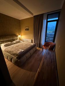 A bed or beds in a room at Old district