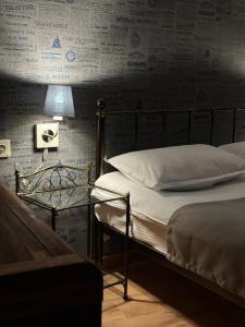 A bed or beds in a room at Old district