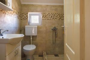 Koupelna v ubytování Apartmani Đorđević + 6 fotografií