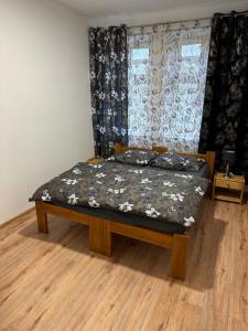 Кровать или кровати в номере Nowy Apartament z jacuzzi w Bielsku-Białej