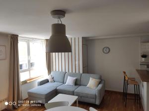 Posezení v ubytování Luminoso y acogedor apartamento en la playa