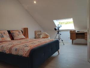Кровать или кровати в номере Chambre en campagne à 15 min Circuit !