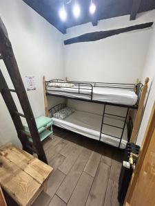 Postel nebo postele na pokoji v ubytování Lua Bierzo