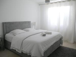Säng eller sängar i ett rum på Private Room in Montpellier