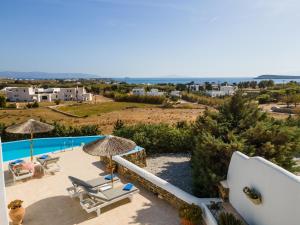 a view of the pool and patio of a villa at Crystal Villa III in Chrissi Akti