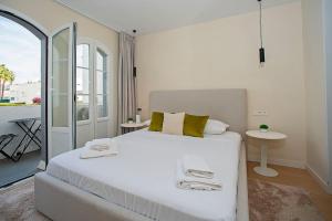 Posteľ alebo postele v izbe v ubytovaní Beautiful and Quiet Family Townhouse in Great Location