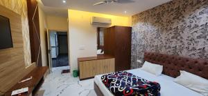 A bed or beds in a room at RBS Hotel & Restaurant 5 mint walking distance from Ram Janam Bhumi