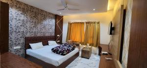 A bed or beds in a room at RBS Hotel & Restaurant 5 mint walking distance from Ram Janam Bhumi