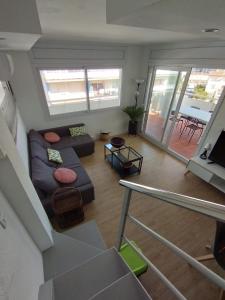 Posedenie v ubytovaní Atico of 3 rooms, total 130m² just for you with a 60 m² terrace, swimming pool, mountain and marina view.