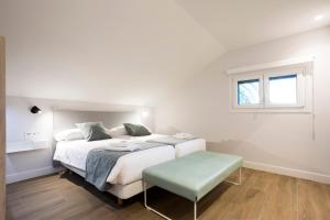 Łóżko lub łóżka w pokoju w obiekcie Villa Carmen by Basquelidays