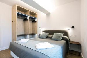Łóżko lub łóżka w pokoju w obiekcie Villa Carmen by Basquelidays