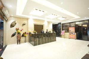 Lobby o reception area sa Hotel Pradeep Star Inn