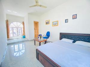 Katil atau katil-katil dalam bilik di Pall Residency