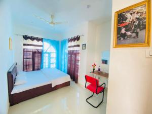 Katil atau katil-katil dalam bilik di Pall Residency